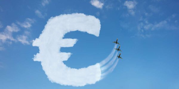Euro currency buy price growth and volatility concept with sign element made of clouds on blue background over sky, jet plane pull cloud up