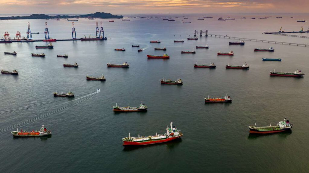 Aerial view oil and gas tanker cargo ship offshore at the port, Business commercial petroleum industry refinery fuel chemical and natural gas import export logistic and transportation by tanker vessel.